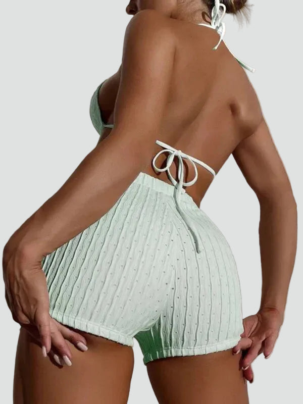 Lace-up high-waisted bikini with a triangular top and shorts