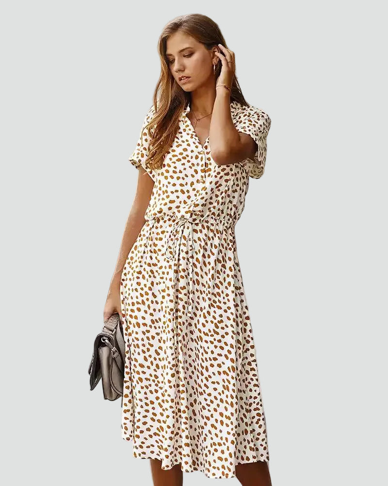 Light midi dress with patterns and waist tie