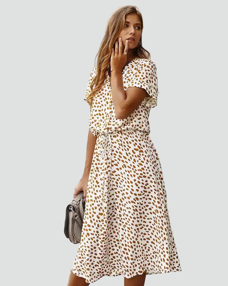 Light midi dress with patterns and waist tie