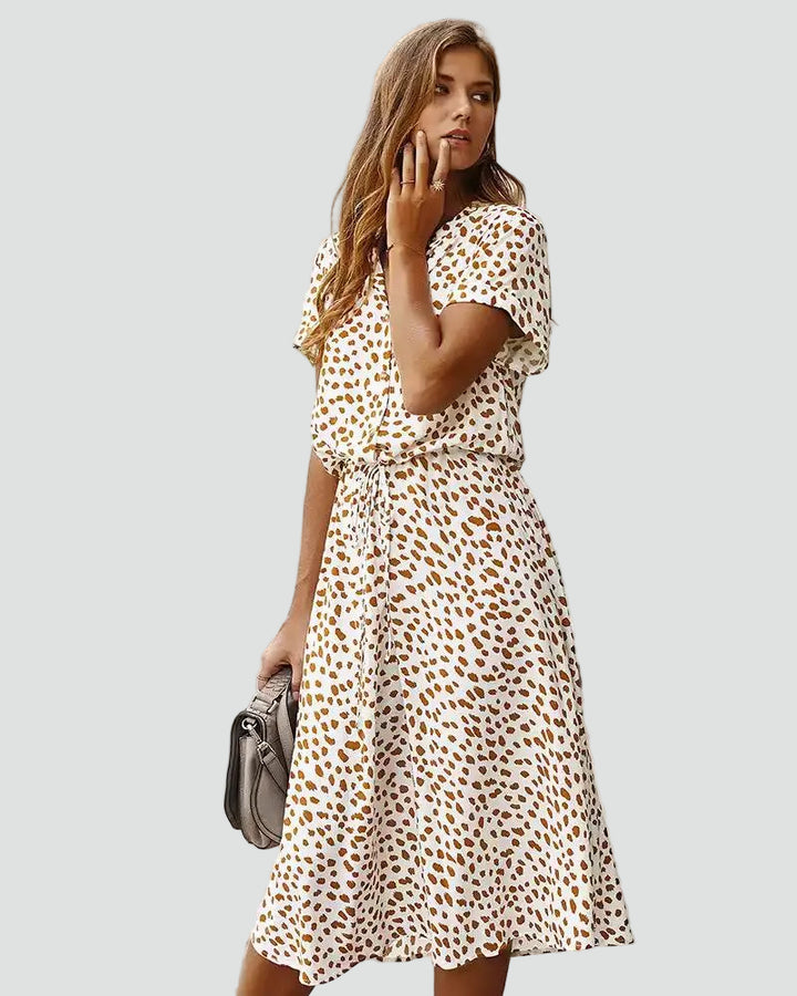 Light midi dress with patterns and waist tie