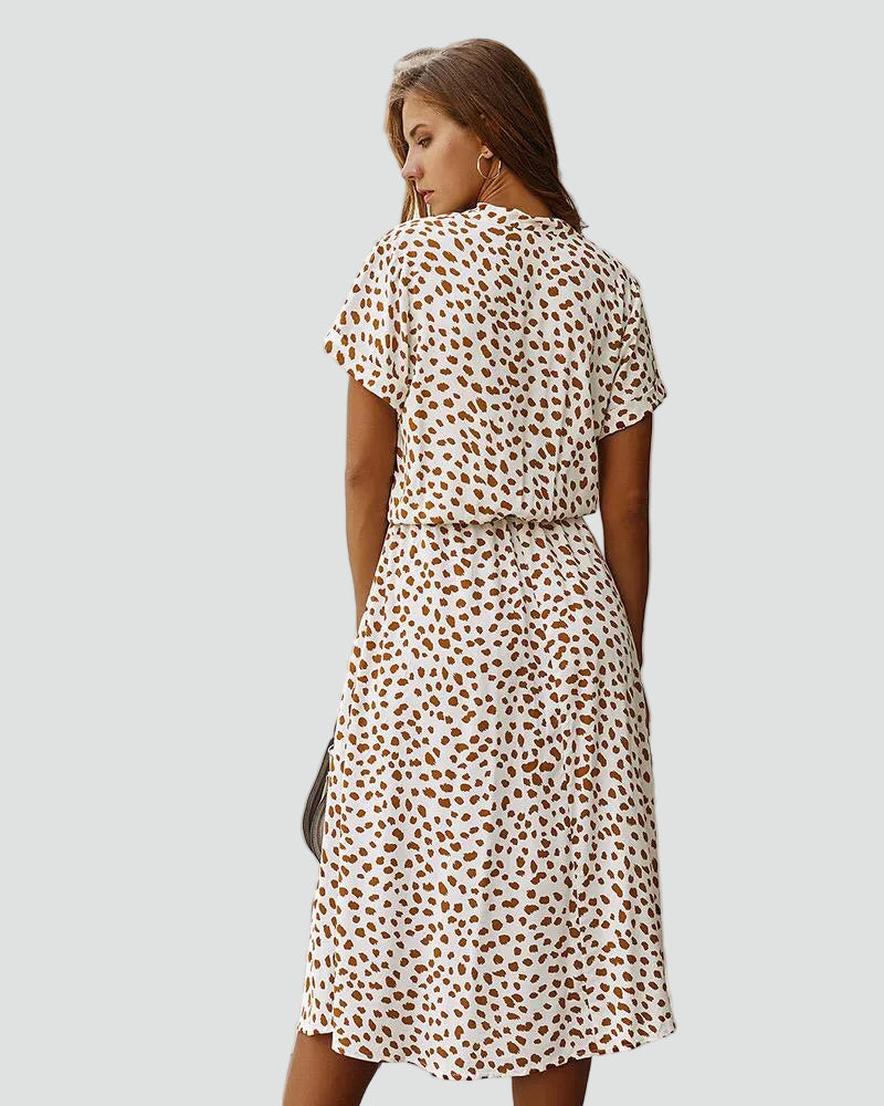 Light midi dress with patterns and waist tie