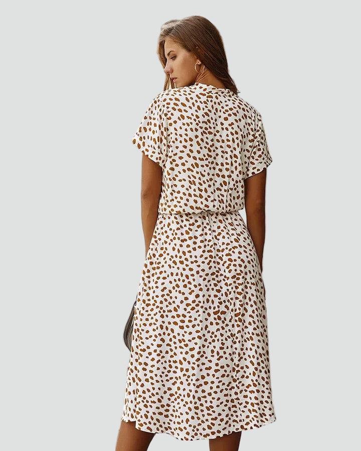 Light midi dress with patterns and waist tie