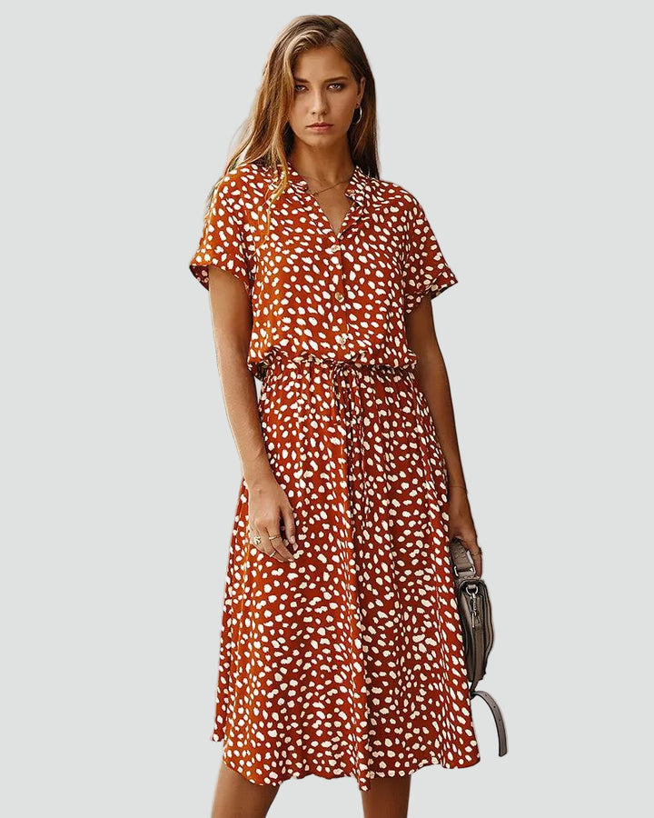 Light midi dress with patterns and waist tie