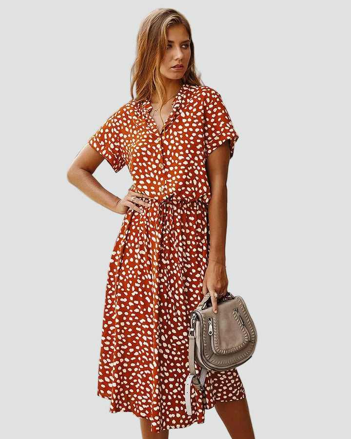 Light midi dress with patterns and waist tie