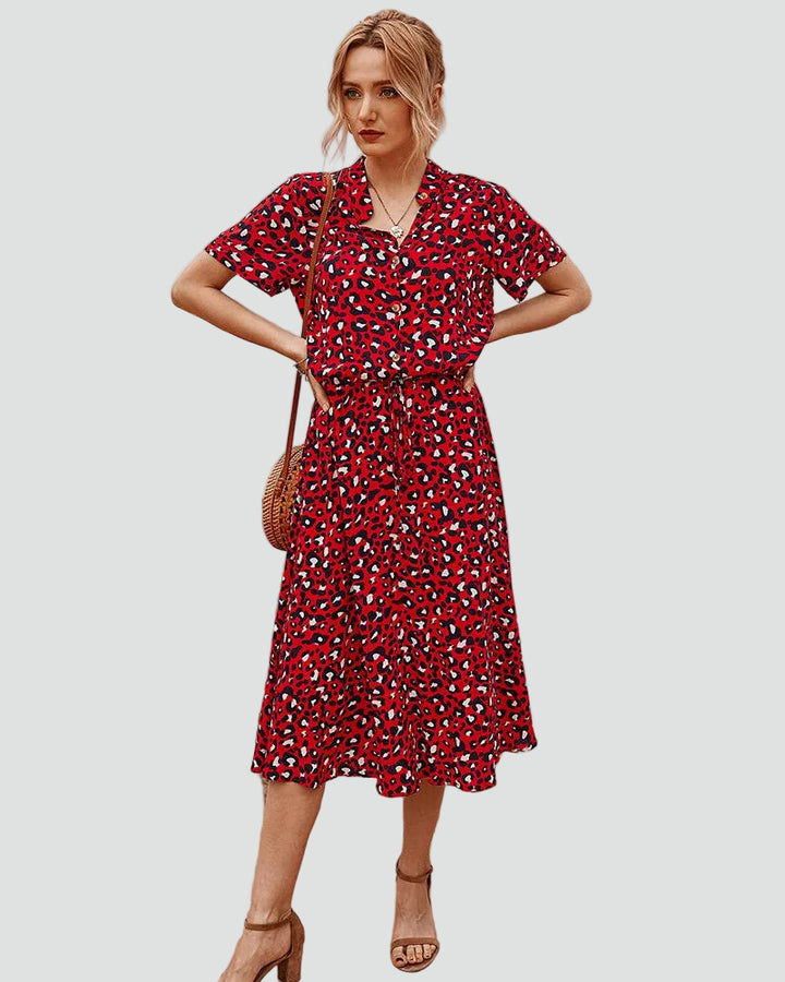 Light midi dress with patterns and waist tie