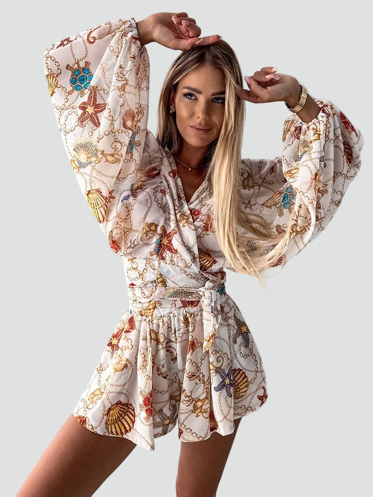 Letni kombinezon damski boho w kwiaty kopertowy z długim rękawem