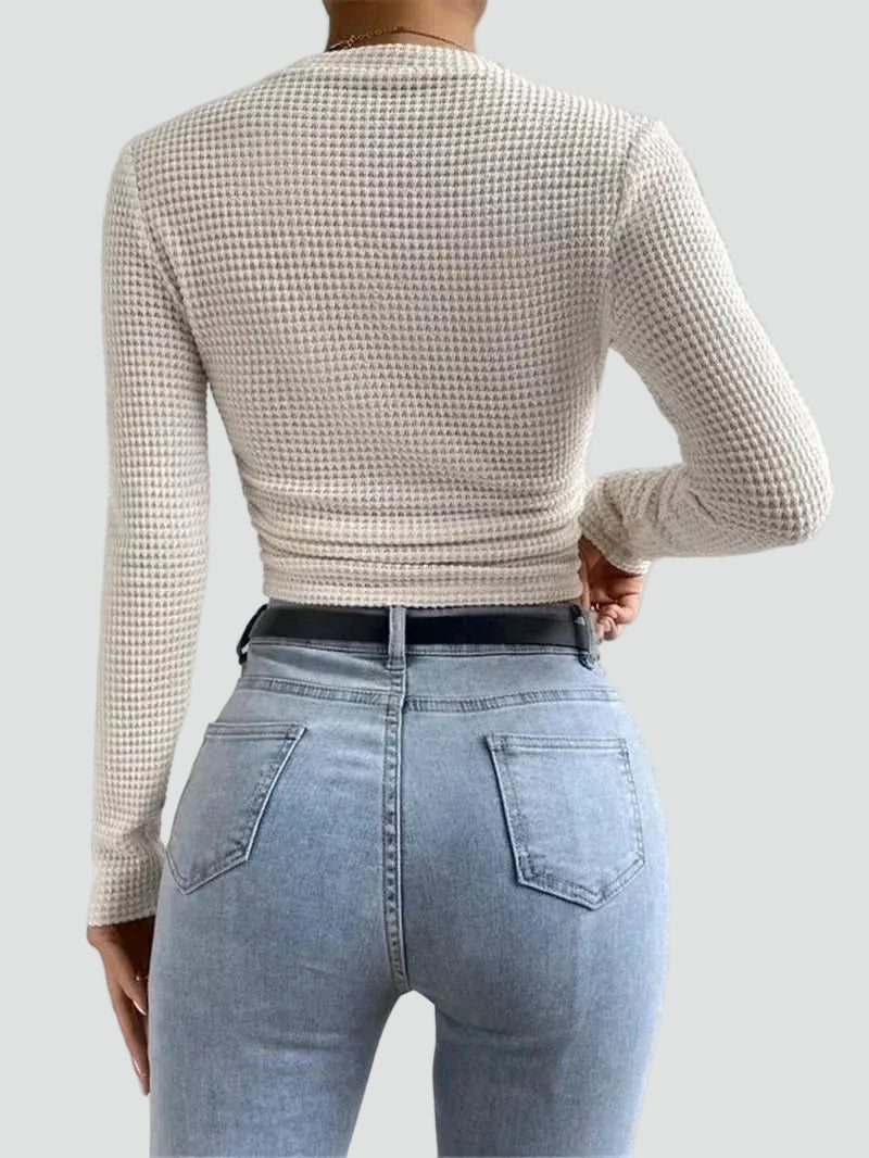 Knit crop top with long sleeves and a fitted cut