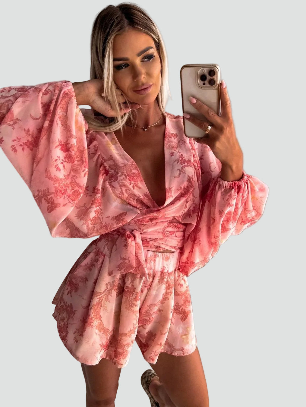 Letni kombinezon damski boho w kwiaty kopertowy z długim rękawem