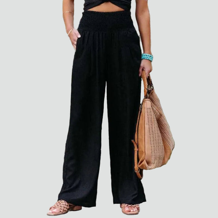 Summer palazzo pants with a gathered waist and loose fit