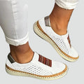 Orthopedic women's moccasins with perforation and elastic inserts