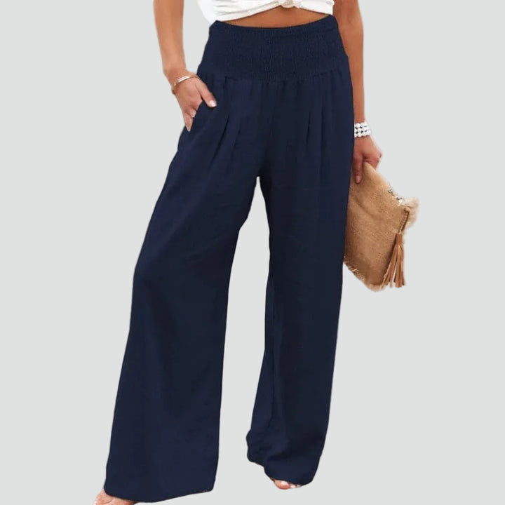 Summer palazzo pants with a gathered waist and loose fit