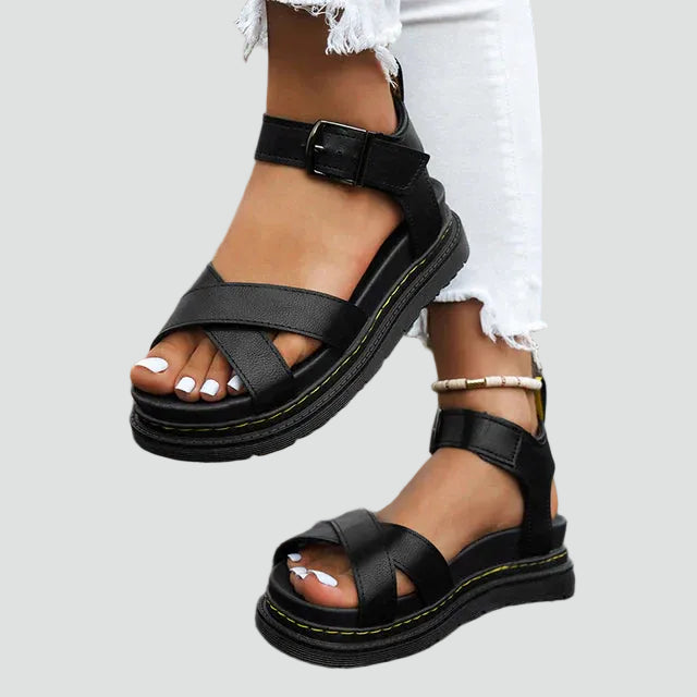 Platforms with cross straps and adjustable fastening