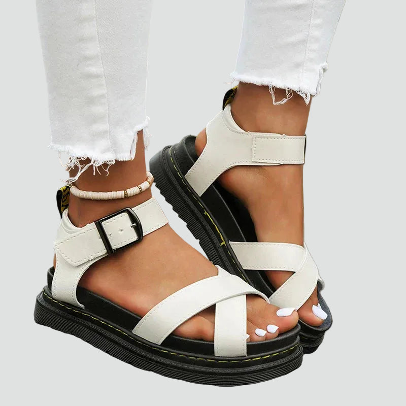 Platforms with cross straps and adjustable fastening