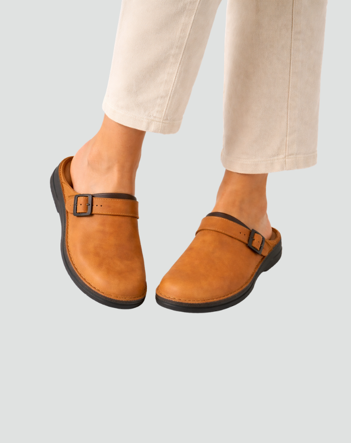 Leather clogs with buckle and closed toe for women
