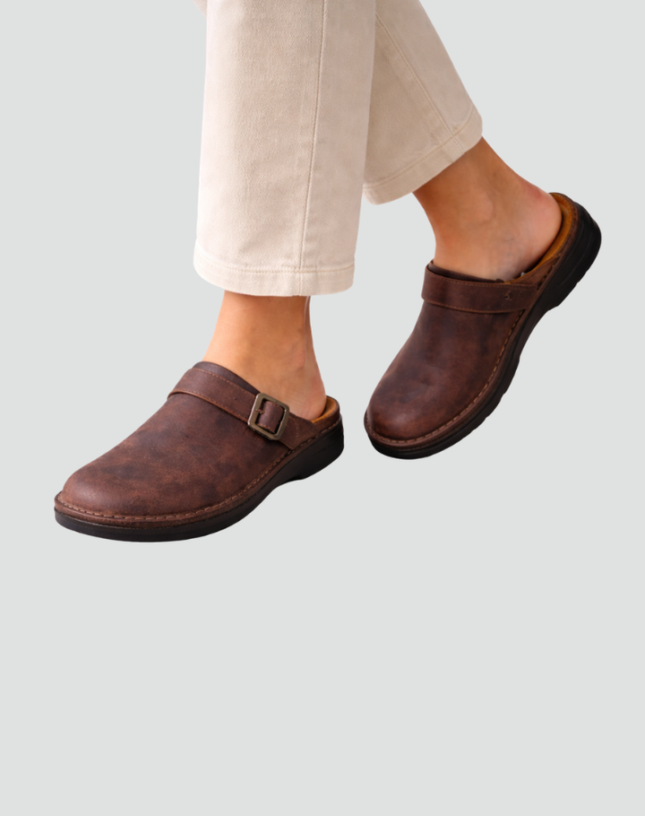 Leather clogs with buckle and closed toe for women