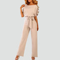 Elegant women's jumpsuit with short sleeves and waist tie