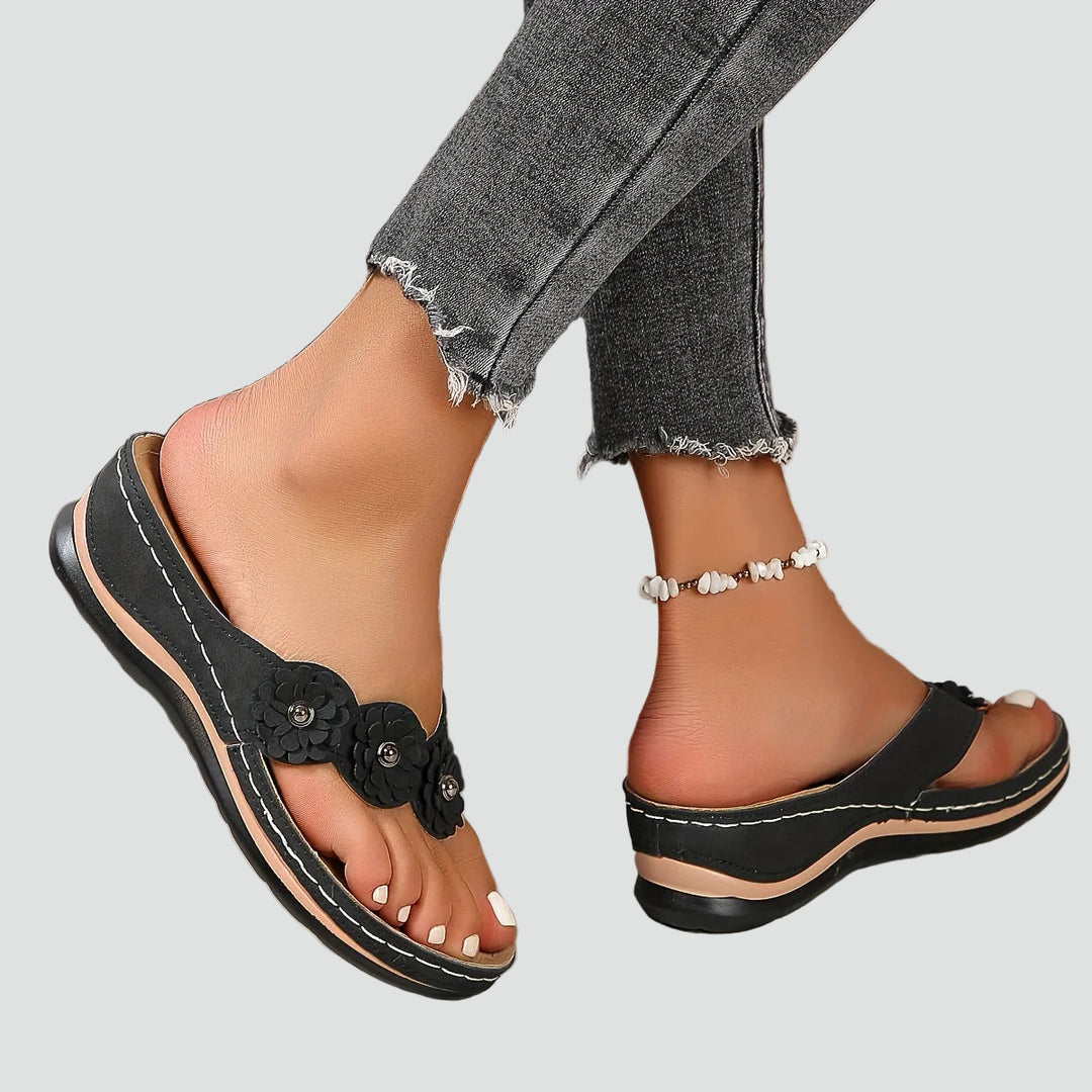 Wedge sandals with floral applique and comfortable design