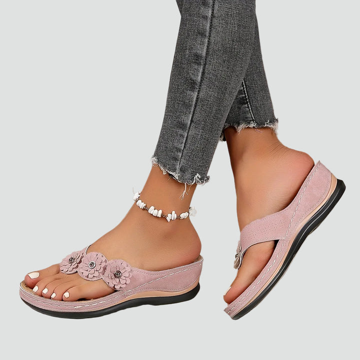 Wedge sandals with floral applique and comfortable design