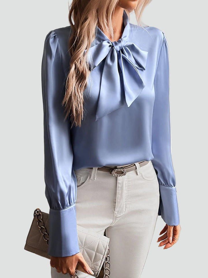 Elegancka damska bluzka z wiązaniem pod szyją i długim rękawem