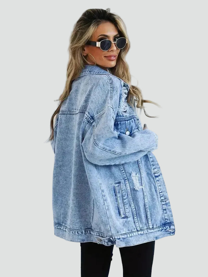 Oversized women's denim jacket with distressing for everyday wear