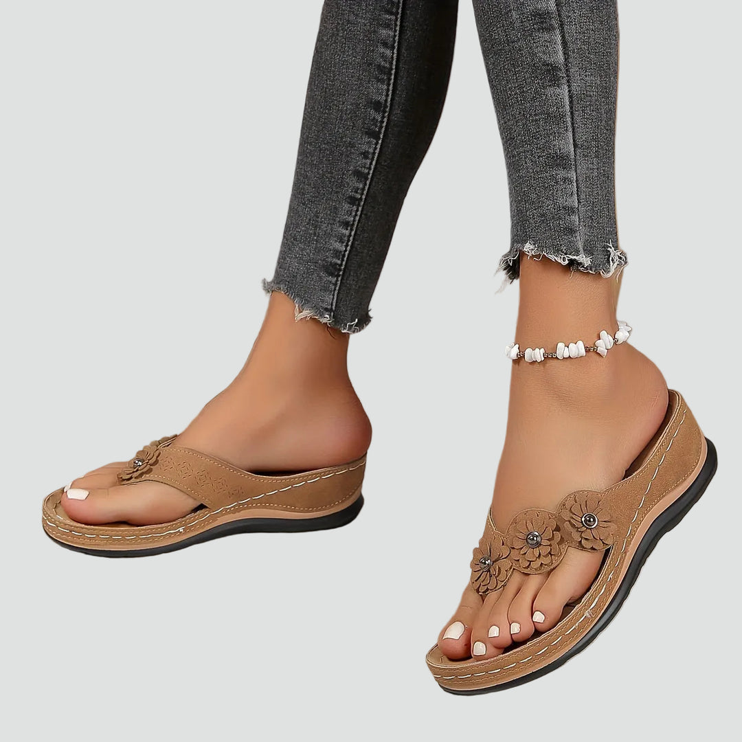 Wedge sandals with floral applique and comfortable design