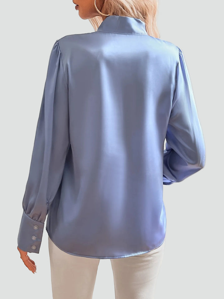 Elegancka damska bluzka z wiązaniem pod szyją i długim rękawem