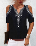 Trendy women's top with a V-neck and glitter pattern