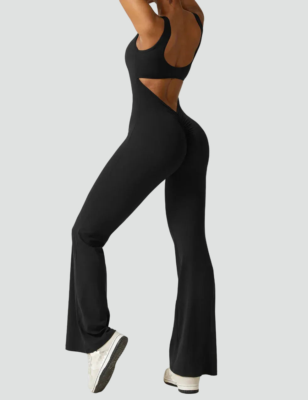 Women's sporty jumpsuit with back cutout and flare legs