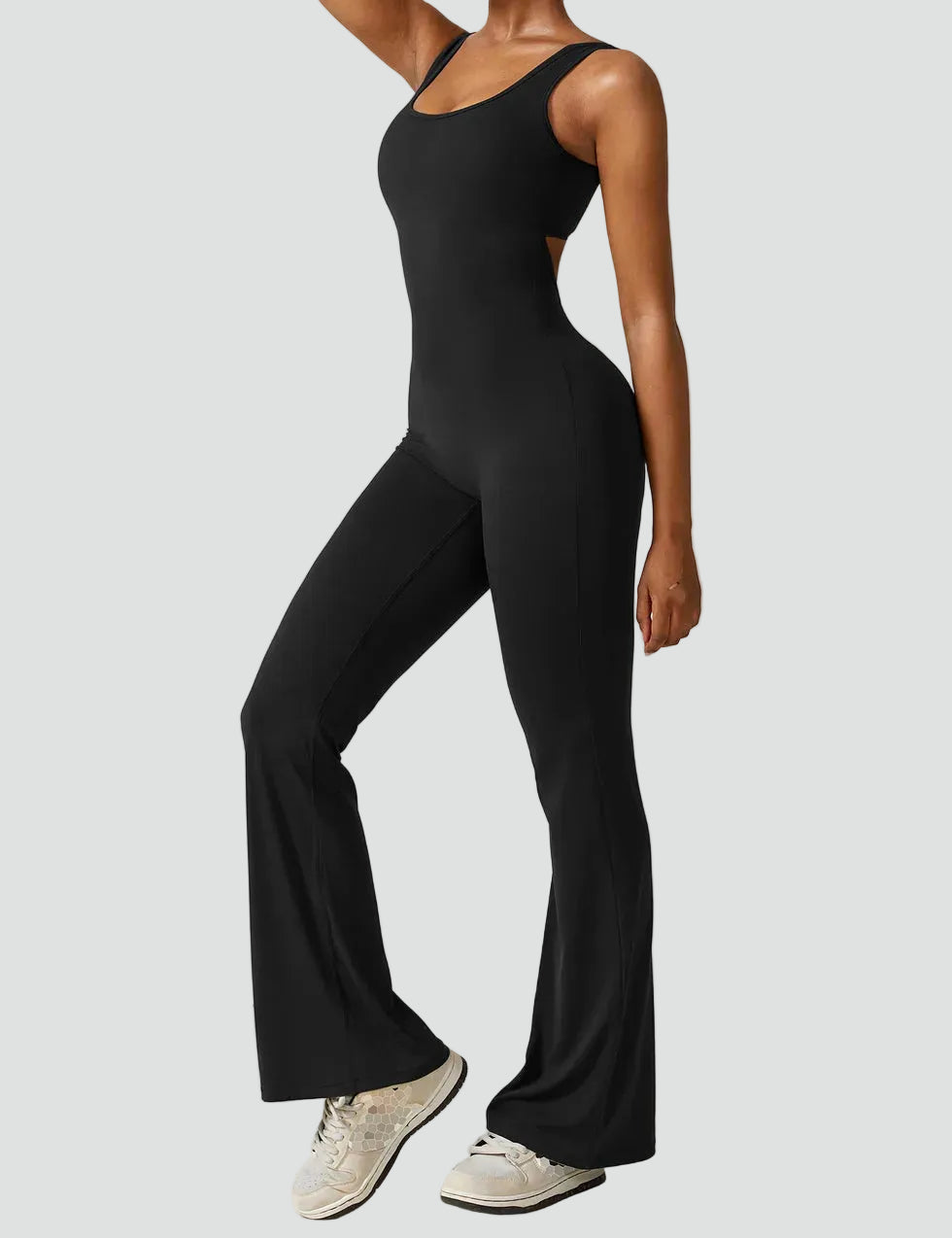 Women's sporty jumpsuit with back cutout and flare legs