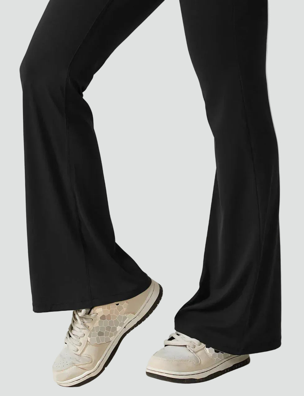 Women's sporty jumpsuit with back cutout and flare legs