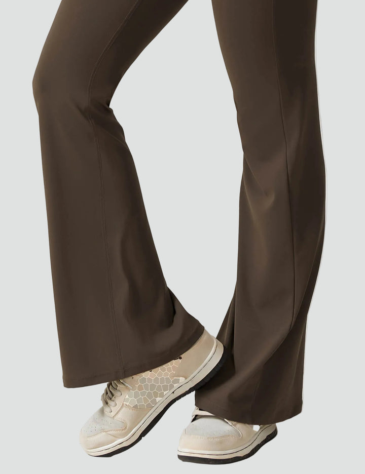 Women's sporty jumpsuit with back cutout and flare legs