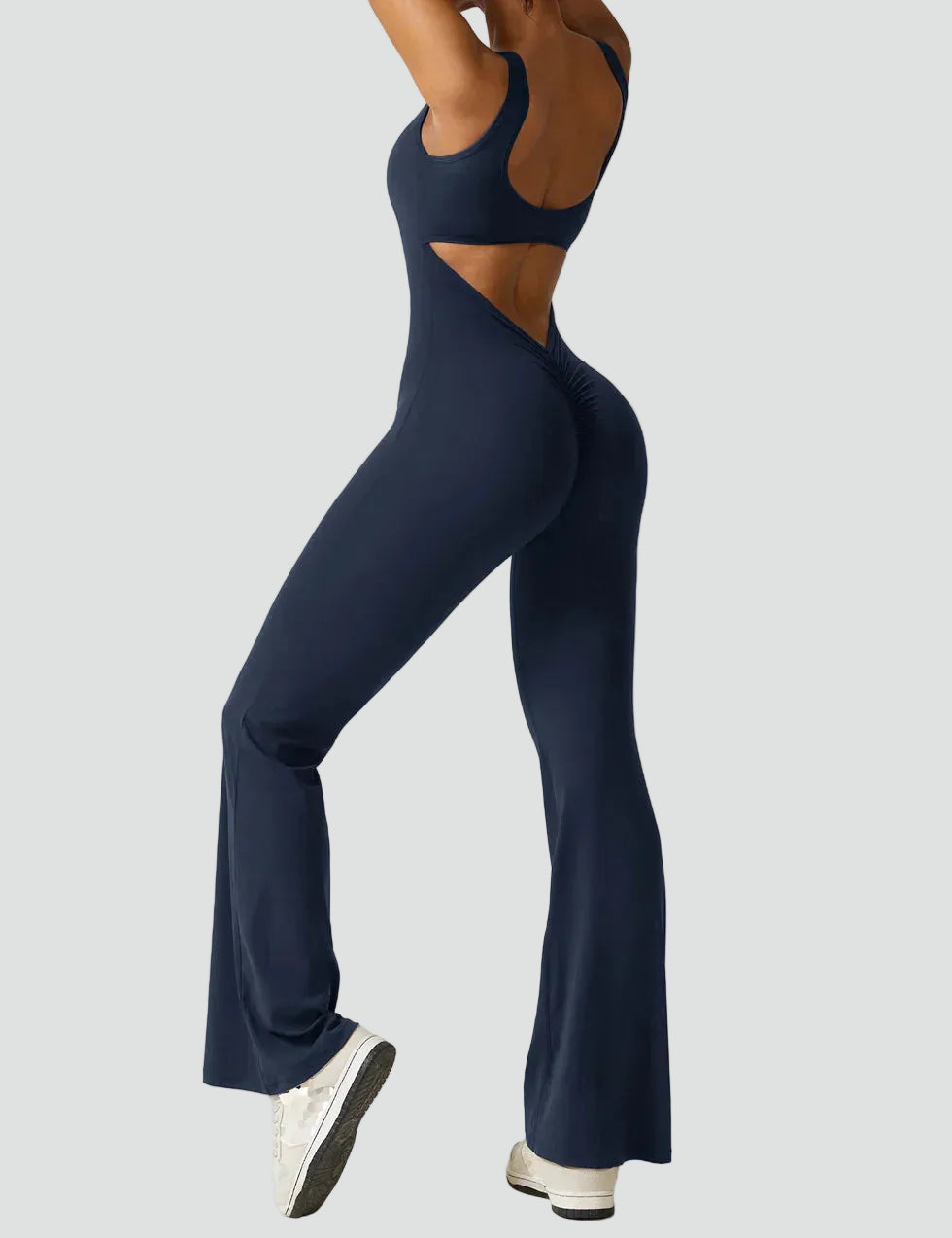 Women's sporty jumpsuit with back cutout and flare legs