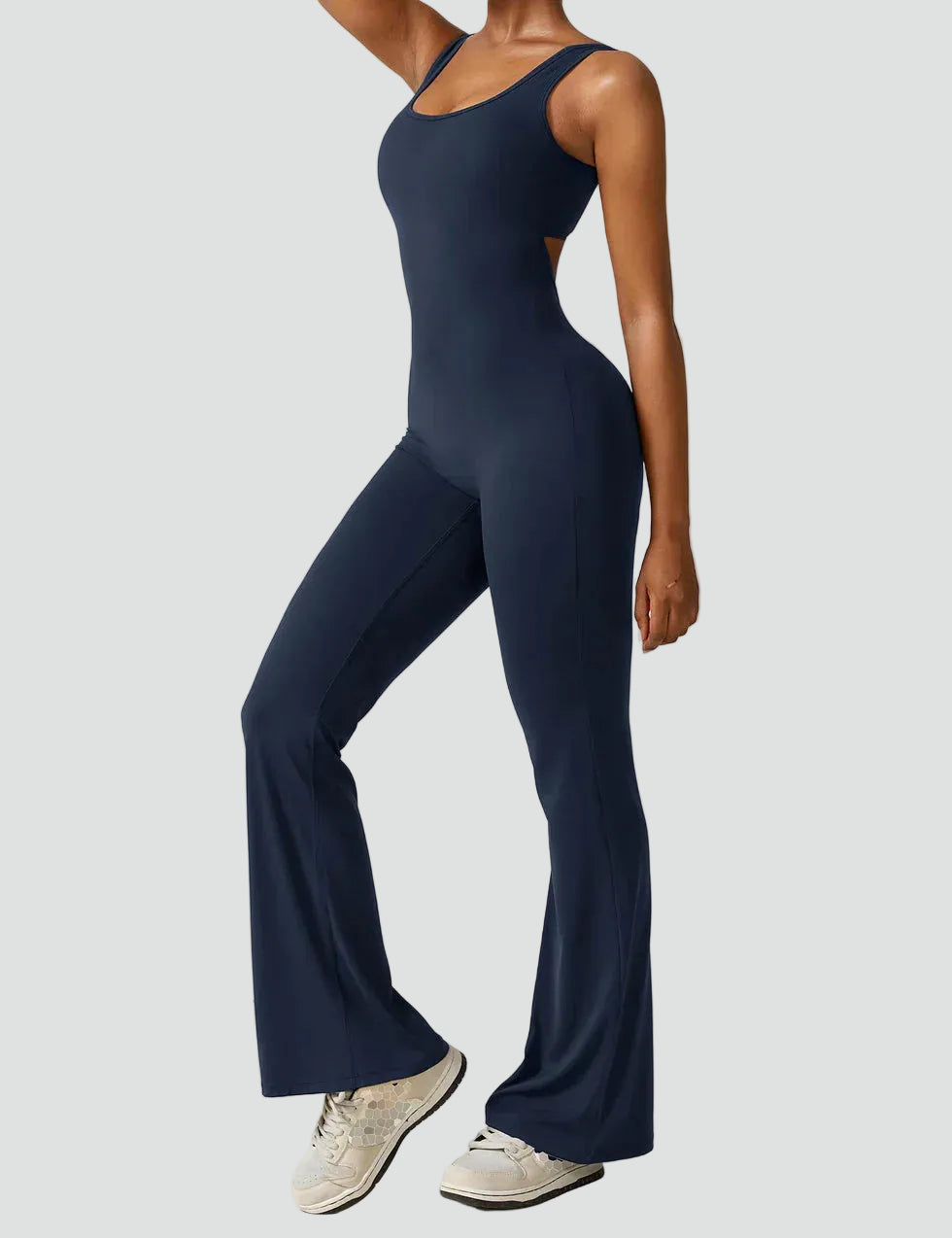 Women's sporty jumpsuit with back cutout and flare legs
