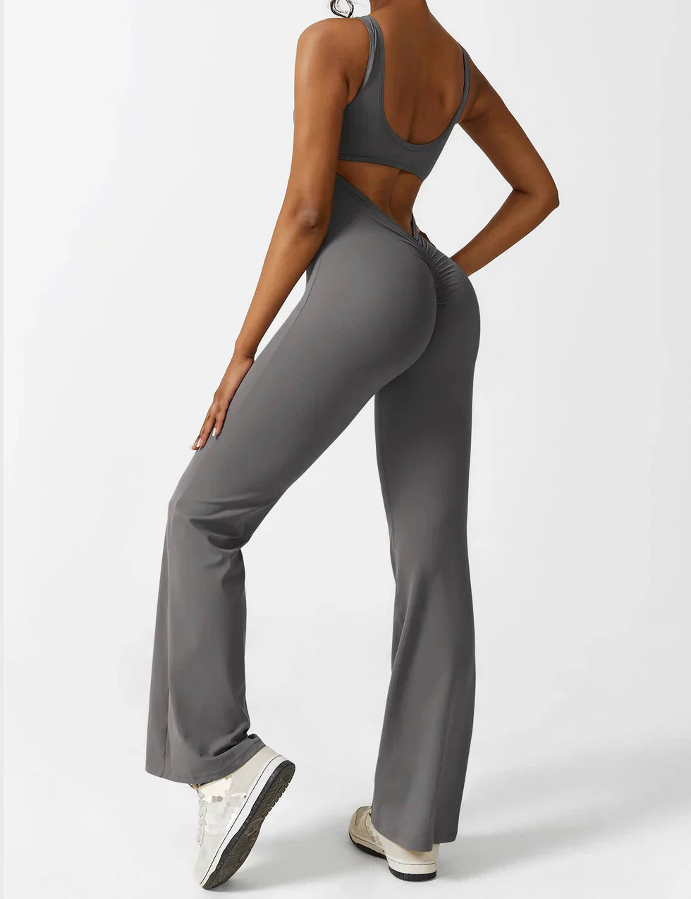 Women's sporty jumpsuit with back cutout and flare legs