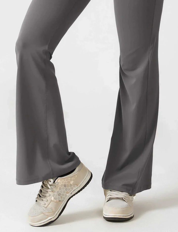 Women's sporty jumpsuit with back cutout and flare legs