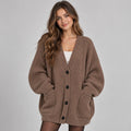 Warm oversized damesvest met knopen en zakken