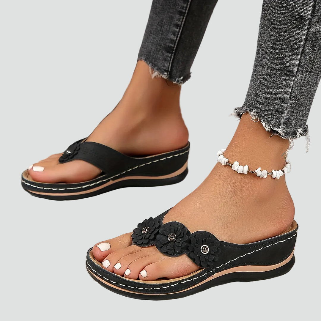 Wedge sandals with floral applique and comfortable design