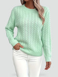 Pull femme à motif torsadé et coupe ample