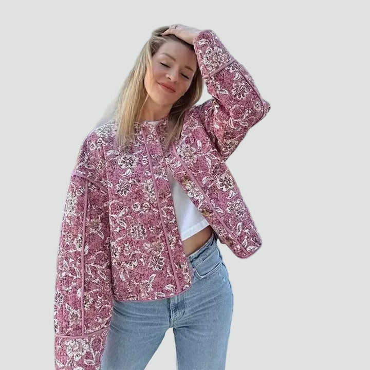 Short pink quilted women's jacket with floral pattern