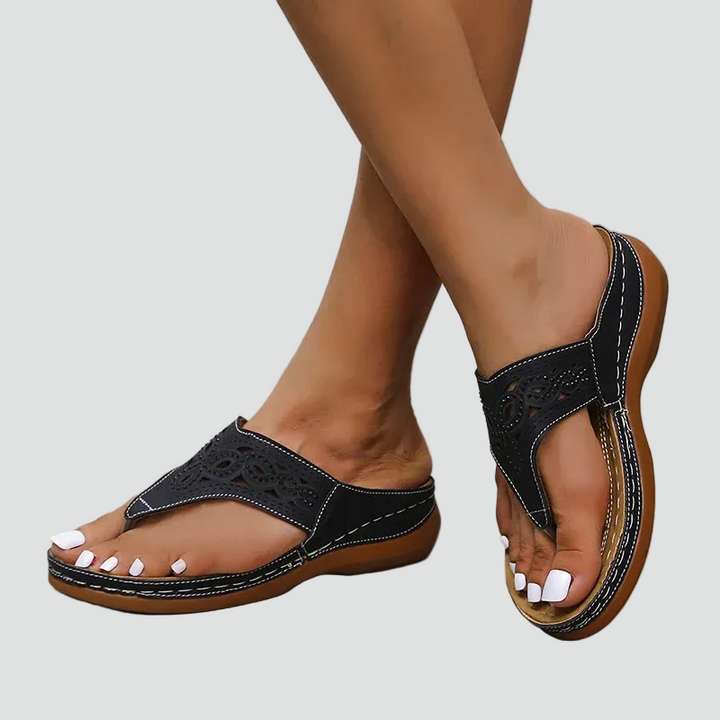 Women's flip-flops with a lace pattern and comfortable sole