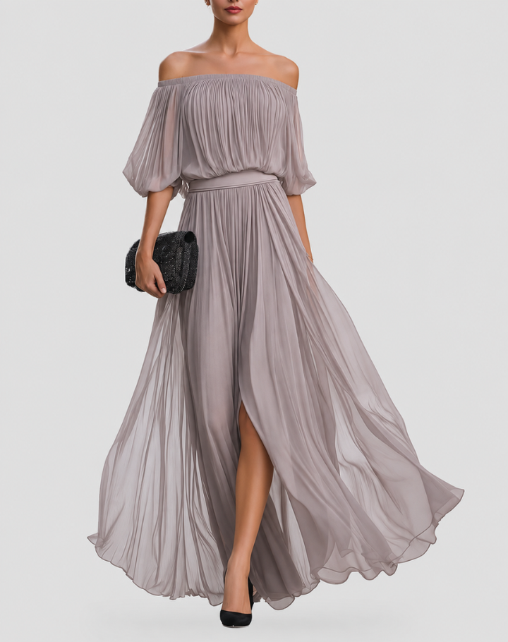 Maxi dress for a wedding with off-the-shoulder design and a pleated skirt