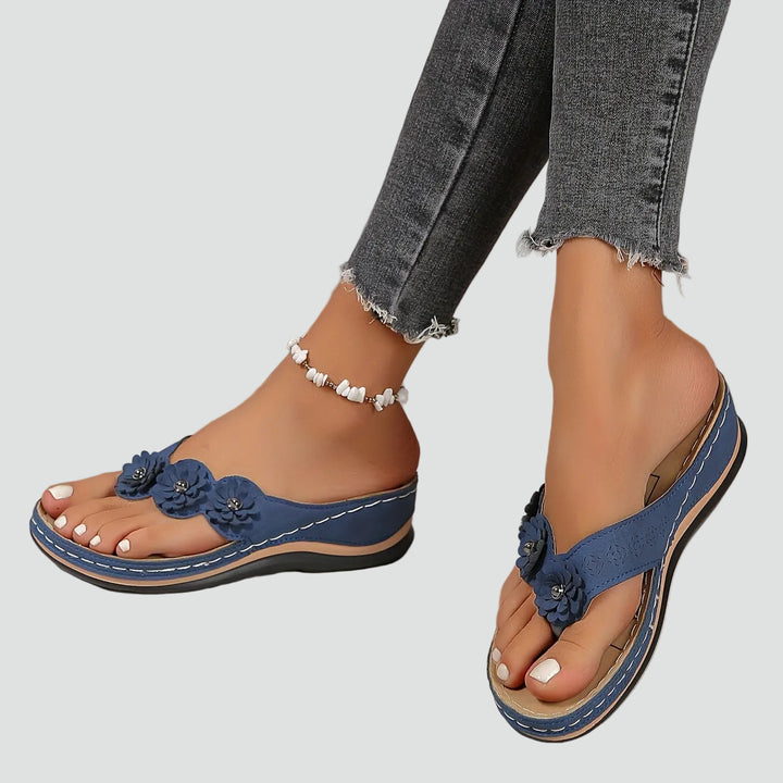 Wedge sandals with floral applique and comfortable design