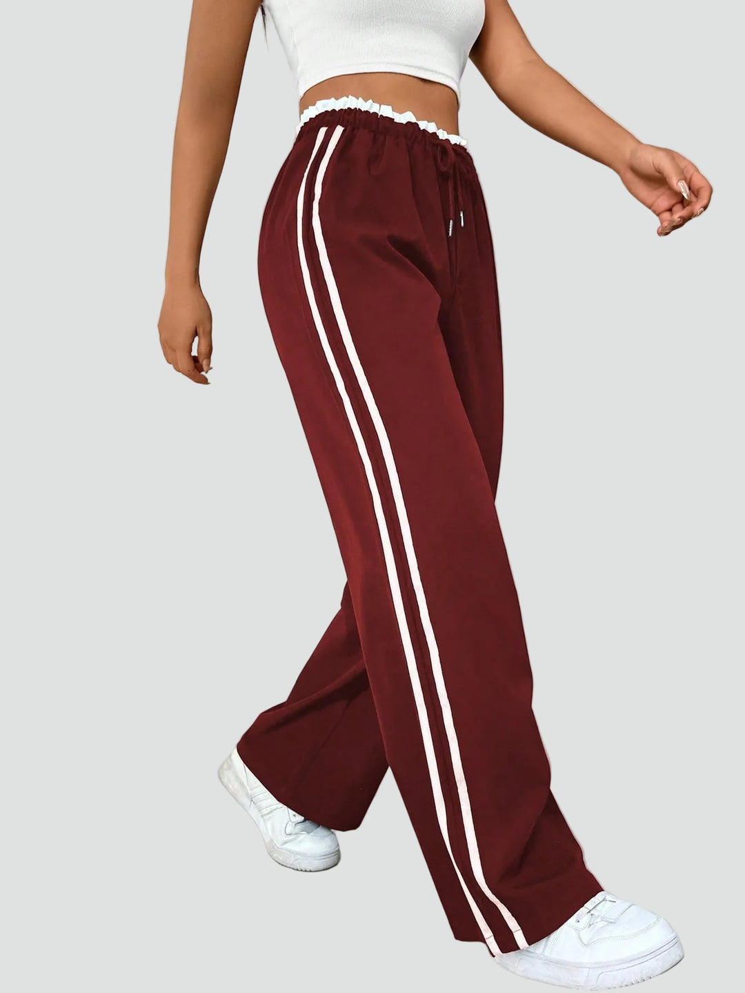 Damskie dresowe spodnie wide leg z lampasami