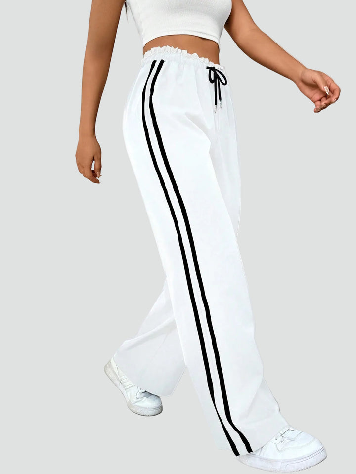 Damskie dresowe spodnie wide leg z lampasami