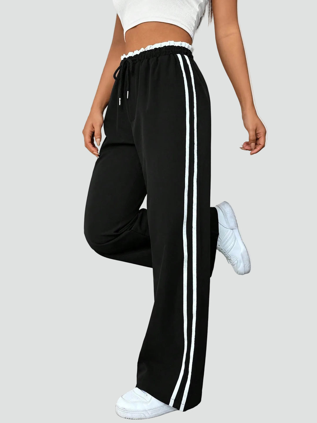 Damskie dresowe spodnie wide leg z lampasami