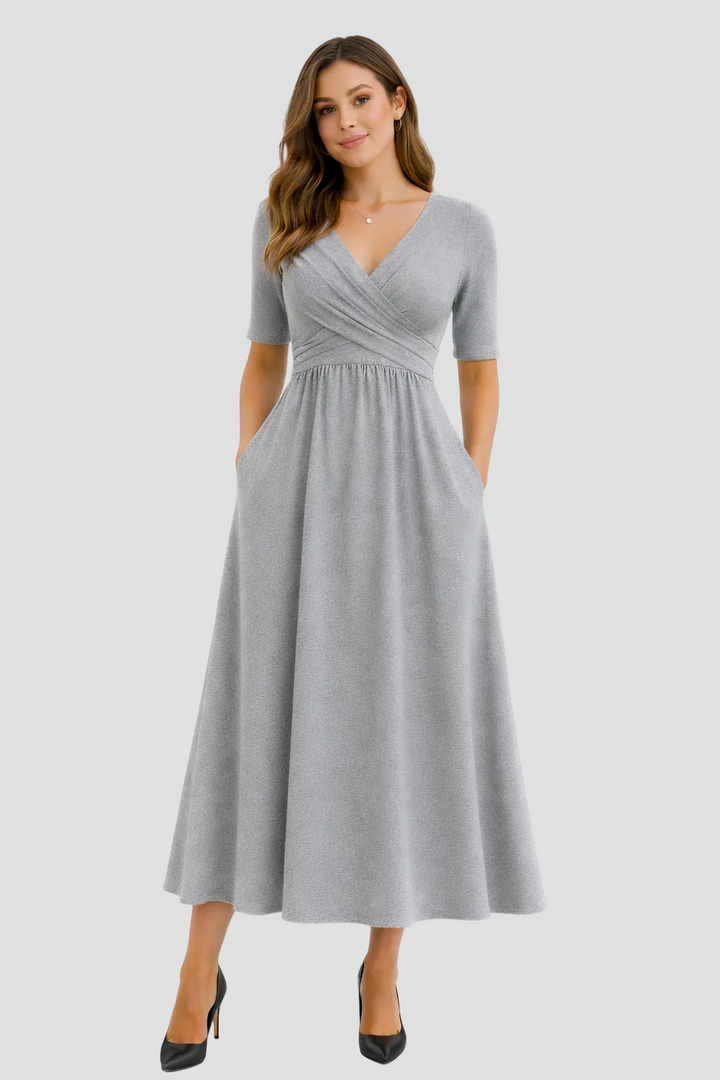 Sukienka midi koktajlowa z kopertowym dekoltem i kieszeniami