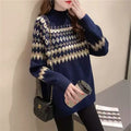 Warm women's sweater with a Norwegian pattern and a mock neck