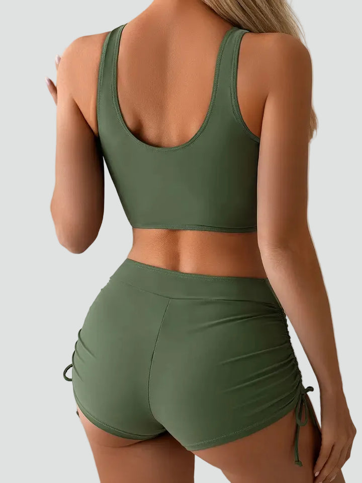 Women's bikini swimsuit with top and high-waisted bottoms