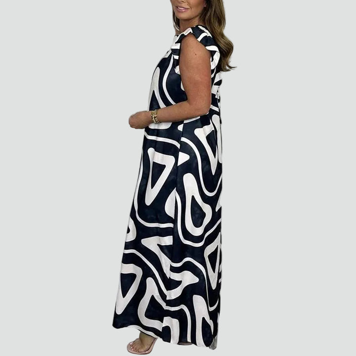 Elegancki damski kombinezon maxi w geometryczny wzór z szerokimi nogawkami