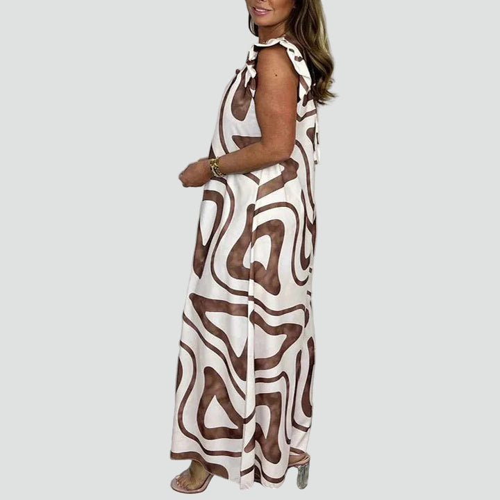 Elegancki damski kombinezon maxi w geometryczny wzór z szerokimi nogawkami